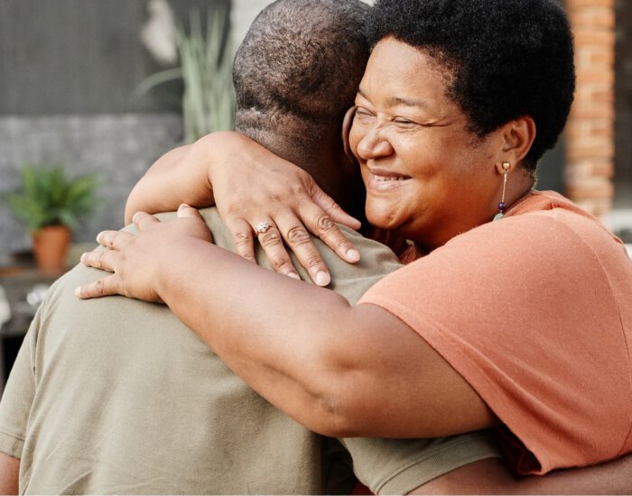 Two people hugging